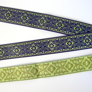 BRONZE AGE narrow Jacquard trim in olive green and sage green on black. Sold by the yard. 5/8 inch wide. 582-B  Geometric trim