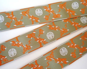 CHINESE BLOSSOMS Jacquard trim, sakura blossoms orange, ivory, on beige. Sold by the yard. 1 1/2 inch wide.  696-A, cherry blossoms