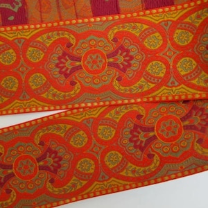 ESCARBUNCLE 2 1/4" wide Jacquard trim in wine red, mustard, olive green, gold, on orange. Sold by the yard. 2 1/4 inch wide. 732(2)-C