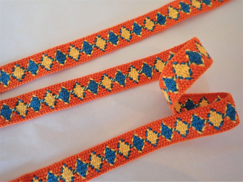 Rustic VOLOS Jacquard trim in turquoise, yellow on orange. Fully reversible. Sold by the yard. 6/8 inch wide. 2095-A Native style trim. image 1