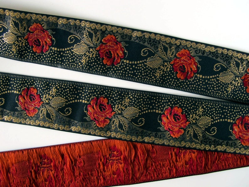 deep red roses on a black jacquard trim with gold details in pointille