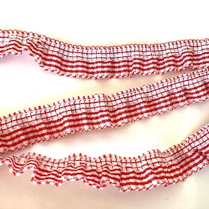 RUCHED red and white striped gingham style, 2 sided RUFFLE. Priced by the yard. 5/8 inch wide. Ruffled elastic edge trim. Red white frill
