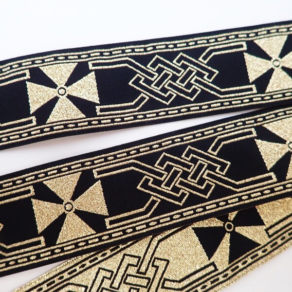 Celtic IRON CROSS Remnants Reversible Jacquard trim in gold and black. REMNANTS. 1 1/4 inch wide. 606-A. Celtic knot