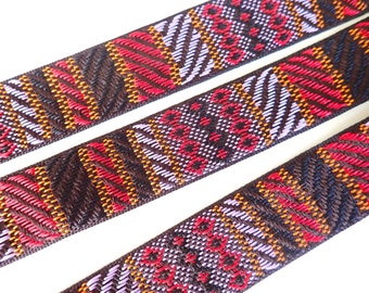 ABUJA Rustic Jacquard color block trim in brown, lavender, orange, red, black. Sold by the yard. 1 1/8 inch wide. 2116-A. Rustic weave