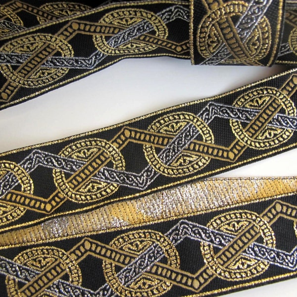 VIKING MEDALLION Jacquard trim in silver, gold, bronze on black. Sold by the yard. 1 1/8 inch wide. 286-A