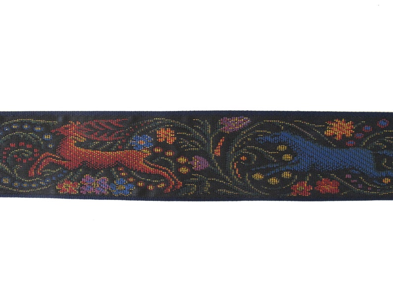 Medieval tapestry wide Jacquard trim with a brown stag and a blue wolf in a floral garden on a black background