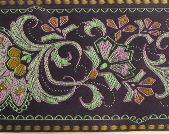 FLORAL SARI BORDER Jacquard trim in green, mauve,  mustard,  gold, on deep purple. Sold by the yard.  2 1/4 inch wide. 976-F.  brocade trim
