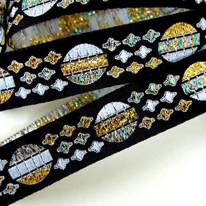ECLIPSE, Moon, Sun and Stars Jacquard trim in Gold, Silver Turquoise on Black. Sold by the yard. 3/4 inch wide. 2058-A. Gothic Astronomy