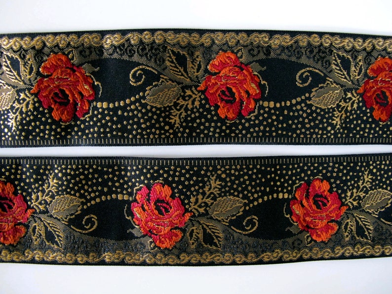 deep red roses on a black jacquard trim with gold details in pointille