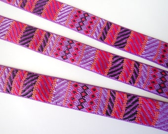 ABUJA Rustic Jacquard color block trim in purple, lavender, orange, red, black. Sold by the yard. 1 1/8 inch wide. 2116-C. Rustic weave