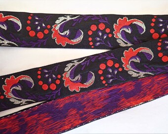Stylized ACANTHUS Vintage Jacquard trim in Red, Purple, Antique Silver on black. 1 1/2 inch wide. 119-A REMNANT