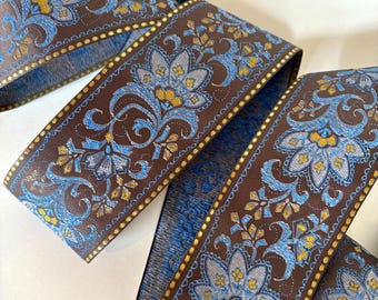 FLORAL SARI BORDER 2 1/4 inch wide Jacquard trim in blue, mustard,  gold, on dark brown. Sold by the yard.  976-C. Brocade