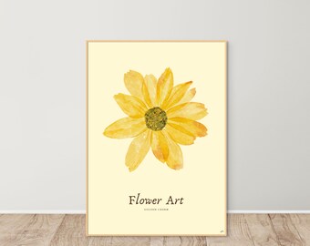 Puede incluir: Una pintura de acuarela de una flor amarilla con un centro verde. La pintura está enmarcada y tiene el texto "Flower Art" y "Golden Charm" debajo de la flor.