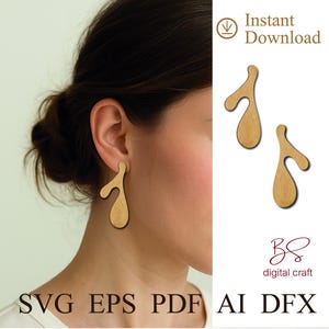 Pode incluir: Brincos de madeira castanho claro com um design abstrato e orgânico, usados por uma pessoa. A imagem inclui o texto "Instant Download" e as abreviações de tipo de arquivo "SVG EPS PDF AI DFX".