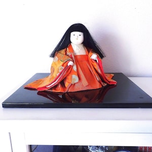 Vintage Ichimatsu Doll: Porcelain Kimono Figurine on Lacquered Base