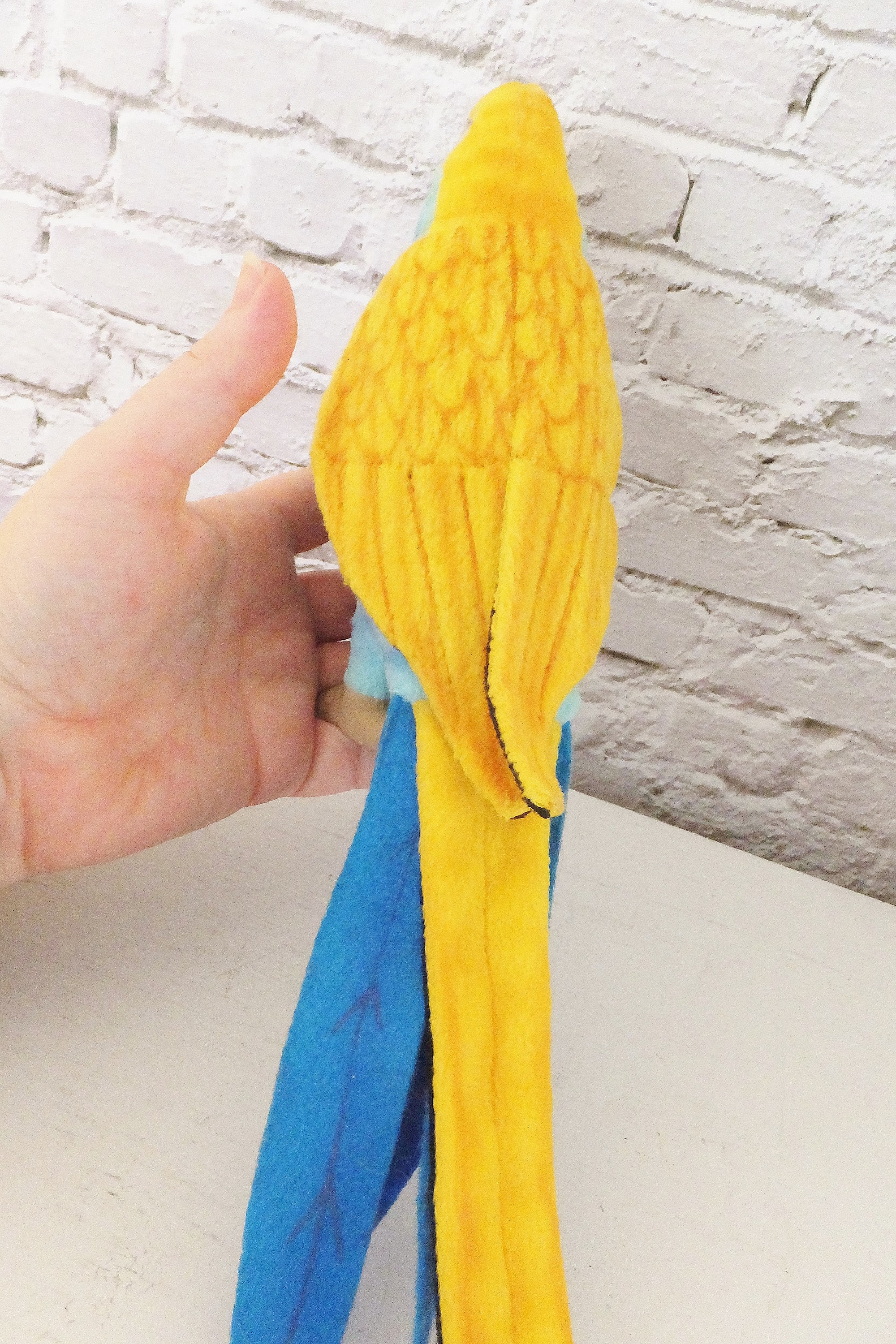 Peluche perroquet jaune 3325 Hansa