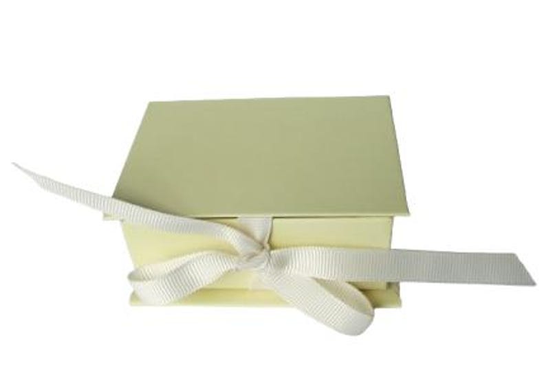 May include: A pale yellow gift box with a white satin ribbon tied in a bow.