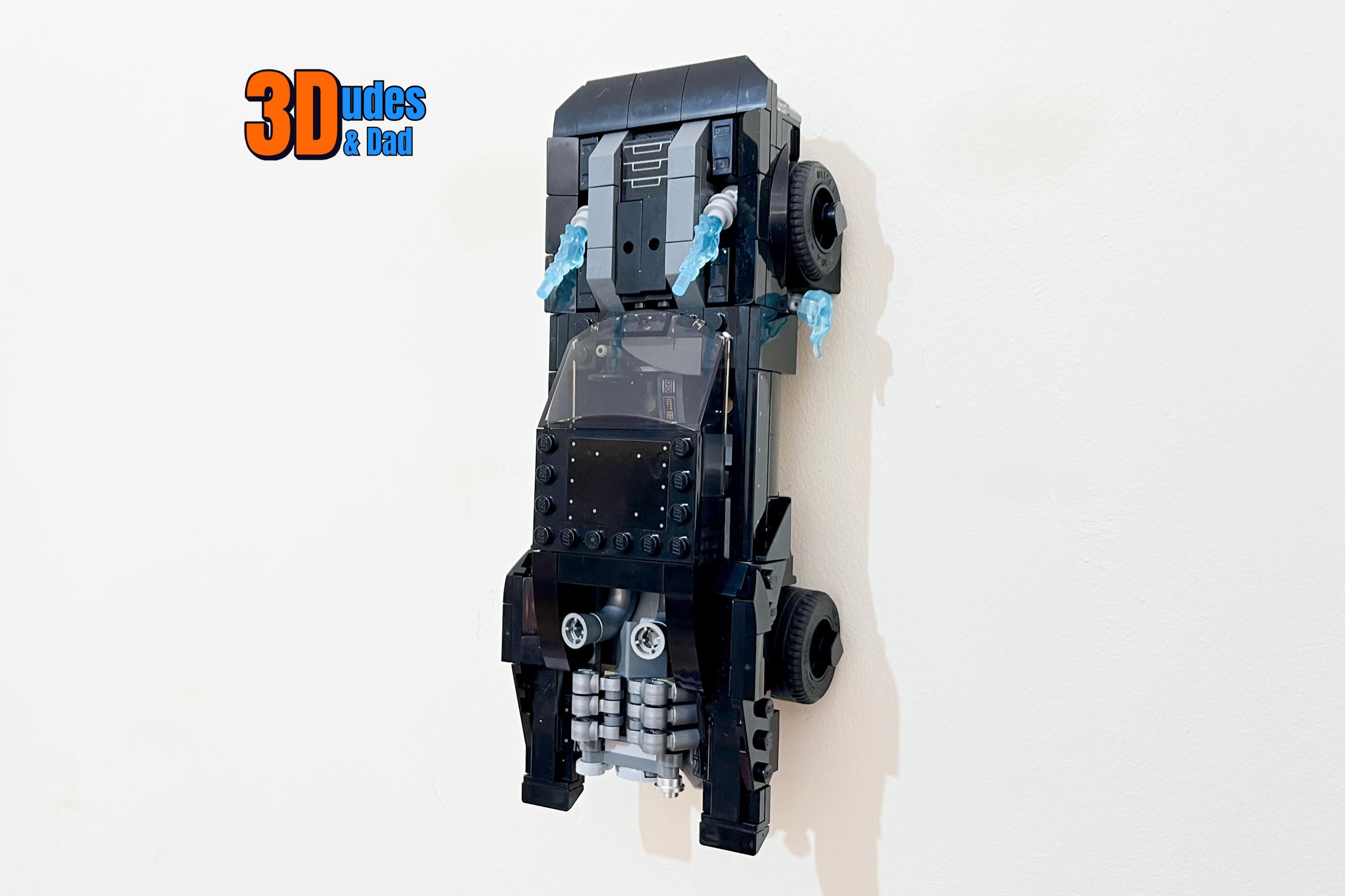 Support de fixation mural pour Batmobile LEGO : La poursuite des pingouins (set 76181) | Crochet de présentation en plastique noir imprimé en 3D sur m
