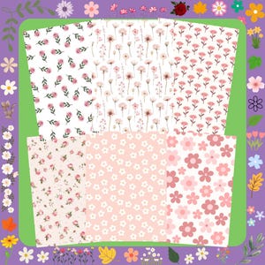 Op de afbeelding: Een verzameling bloemmotiefpapieren in verschillende ontwerpen. De patronen omvatten kleine roze rozen, delicate wilde bloemen en grotere gestileerde bloemen in roze en witte tinten. De papieren zijn gerangschikt op een groene achtergrond met een paarse rand.