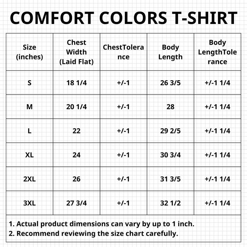 Op de afbeelding: Een witte maattabel voor Comfort Colors T-shirts, met details over de borstbreedte, lichaamslengte en tolerantie in inches voor de maten S t/m 3XL. De tabel bevat de tekst "COMFORT COLORS T-SHIRT".