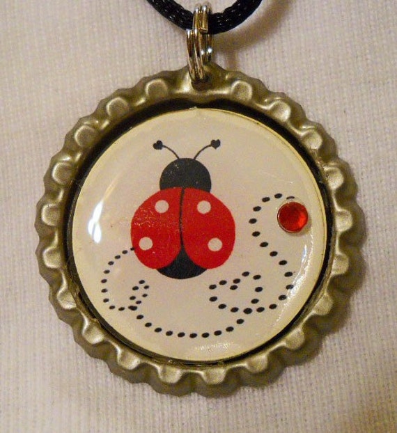Items similar to Love Bug Lady Bug Bottle Cap Necklace on Etsy