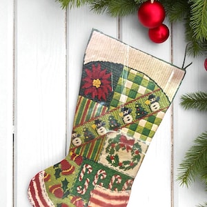 May include: A patchwork Christmas stocking with various festive patterns, including poinsettias, snowmen, and candy canes. The stocking is primarily green, red, and beige, with a striped toe and a loop for hanging. The background features white wooden planks and Christmas ornaments.
