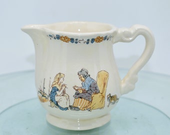 Sarreguemines Enfants Richard Demitasse Creamer, Transfer Ware, France, Grandmother reading a Book to little Girl, Cat