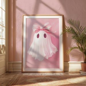 May include: A white ghost with a pink bow on its head, against a pink background. The ghost has two black eyes.