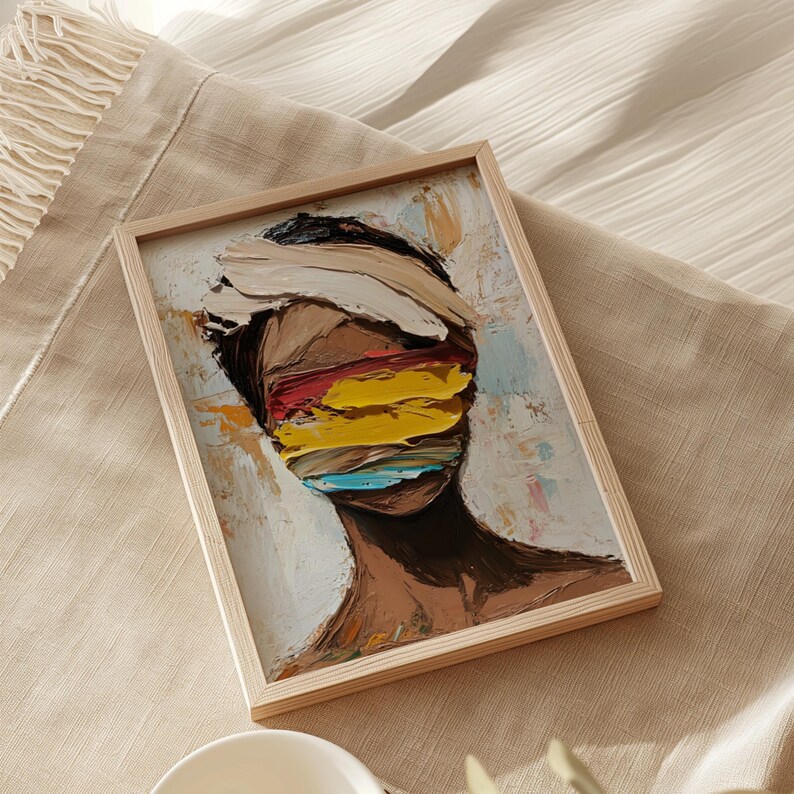 May include: A framed abstract painting of a person's face with colorful brushstrokes covering the eyes. The painting is done in a textured style with a light background.