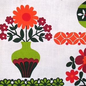 May include: A vintage floral print fabric featuring a green vase with red and green accents, filled with orange and red flowers. The fabric also features a repeating pattern of orange and red circles.