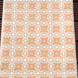 May include: A vintage wallpaper with a repeating pattern of brown and peach squares with a white background.