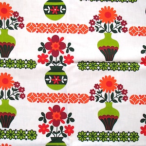 May include: A repeating pattern of stylised flowers in vases on a white background. The flowers are orange, red, and green. The vases are green with brown accents. The background is white with a repeating pattern of orange and green circles.