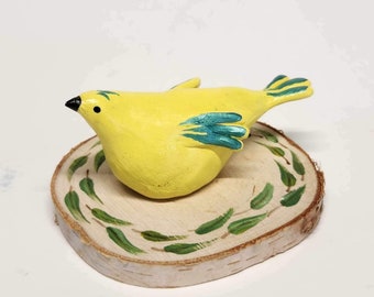 Hand Sculpted Hand Painted Stoneware Yellow Bird Figurine on Birch Round