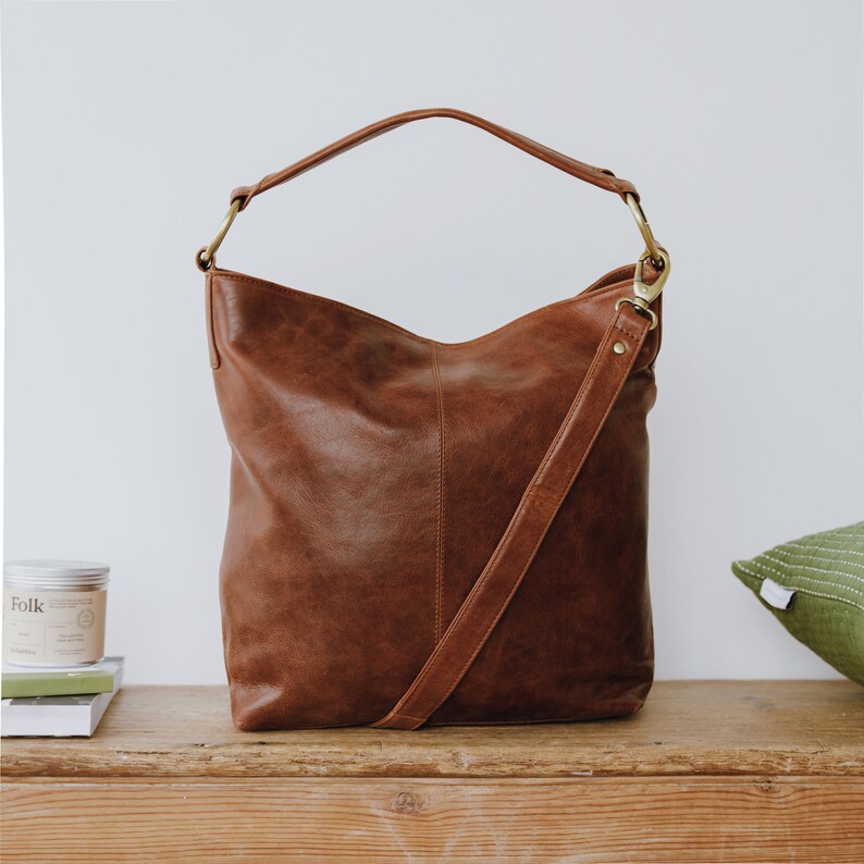 brown leather hobo bag with handle and long shoulder strap