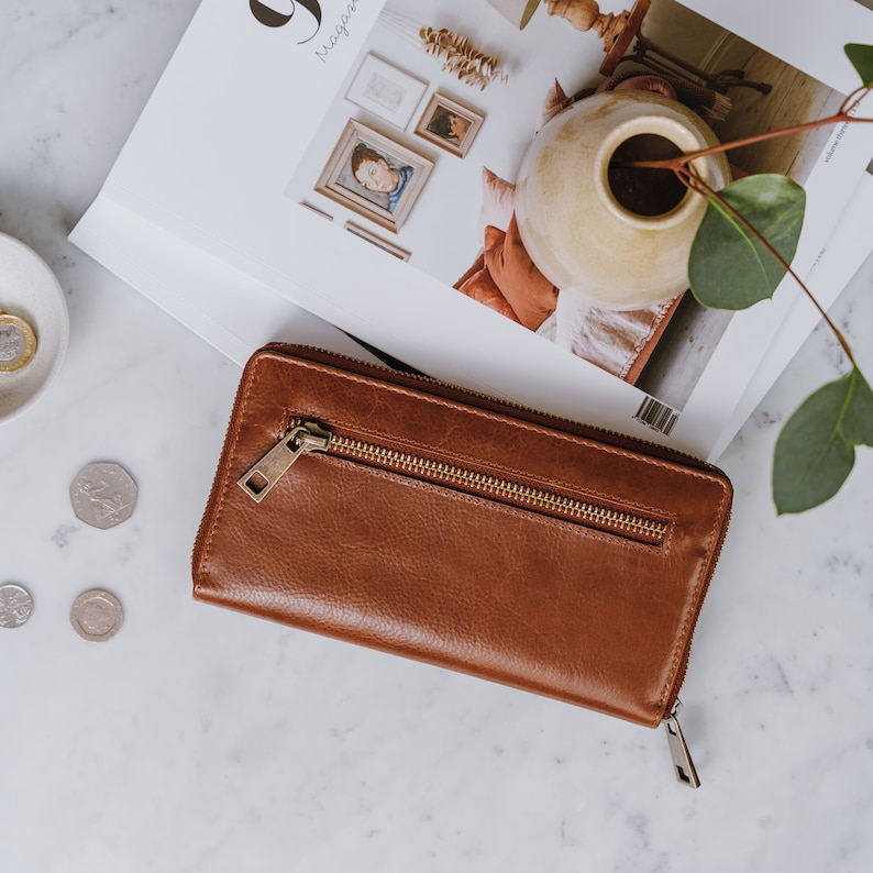 large tan leather ziparound wallet with front pocket