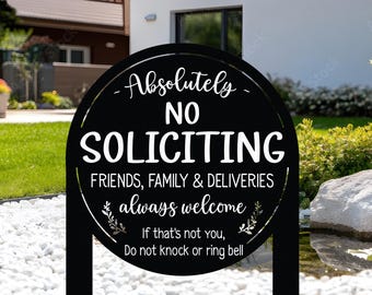 May include: Black metal yard sign with a circular top that reads "Absolutely NO SOLICITING" in white text. The sign also states "FRIENDS, FAMILY & DELIVERIES always welcome" and "If that's not you, Do not knock or ring bell."