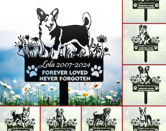 May include: Black metal silhouette of a dog with a memorial sign that reads "Lola 2007-2024 Forever Loved Never Forgotten". The sign is surrounded by flowers and leaves. There are eight similar signs with different dog breeds and names.