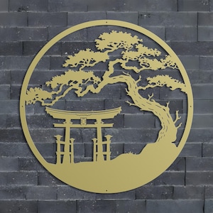 May include: Gold metal wall art featuring a stylised silhouette of a Japanese pine tree and a torii gate. The design is circular and has a rustic, minimalist aesthetic.