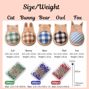 May include: Five wooden pin cushions shaped as a cat, bunny, bear, owl, and fox, with patterned fabric tops. Below are three plastic cases of pins, each containing 100 pins.