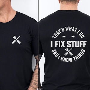 May include: Black t-shirt with a white wrench and screwdriver design on the front and the text "That's what I do I fix stuff and I know things" with a wrench and screwdriver design on the back.