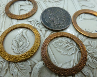 3 Vintage Light Weight, Dapped Unplated Ginger Brass Floral Rings,  Flat backs. approx 22mm in diameter with a 16.25mm center hole C2