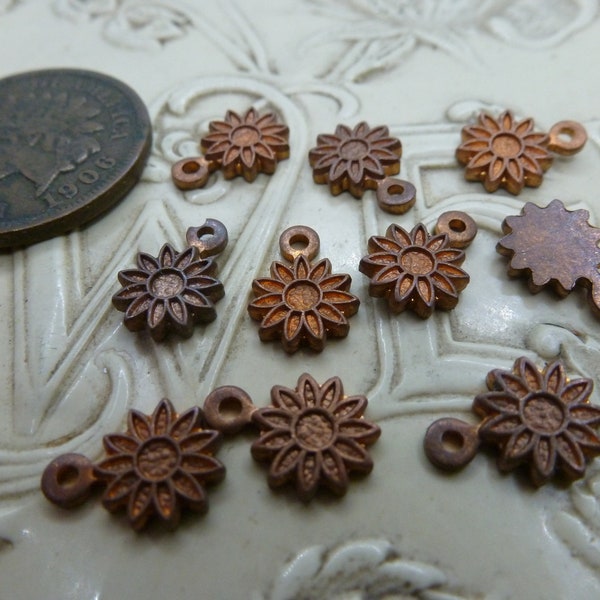 8 vintage 1970s small Copper tone Cast mini Sunflower charms, drops with loop, flat backs, Enamel use. Approx 6.9mm in diameter. C12