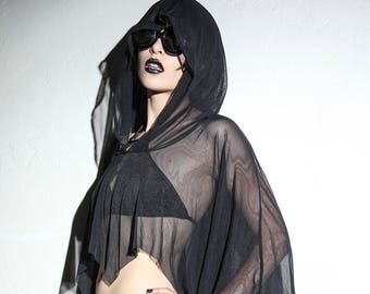 Poncho playero transparente con capucha drapeada