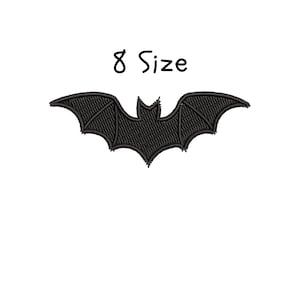 May include: Black embroidered bat with outstretched wings. The text "8 Size" is above the bat. The bat is a Halloween-themed design, perfect for apparel or craft projects.