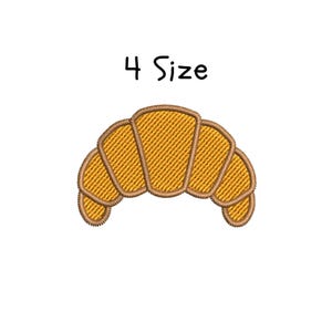 Op de afbeelding: Een geborduurd ontwerp van een croissant in bruin en geel. De tekst "4 Size" staat boven de croissant.