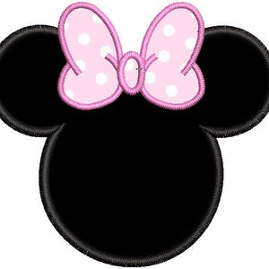 May include: Black and white cartoon mouse head with large pink ears and a pink bow with white polka dots.