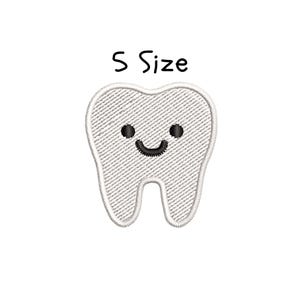 May include: A white embroidered patch in the shape of a tooth with a smiling face. The text "S Size" is above the tooth in black letters. The tooth has a textured appearance.