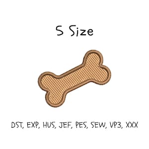 May include: A tan-colored, embroidered dog bone design with the text "S Size" above it. Below the bone are the letters "DST, EXP, HUS, JEF, PES, SEW, VP3, XXX". The bone is a light brown color with a darker brown outline.