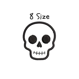May include: Black embroidered skull patch with the text "8 Size" above it. The skull has textured eye sockets, a nose, and a row of teeth. The design is on a white background.