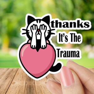 Thanks, It’s the Trauma – Cartoon Cat on Pink Heart Sticker, Funny Mental Health Sticker, Self-Care Cat Decal